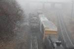 NS 9150 leads a cut of power onto D track on a foggy morning
